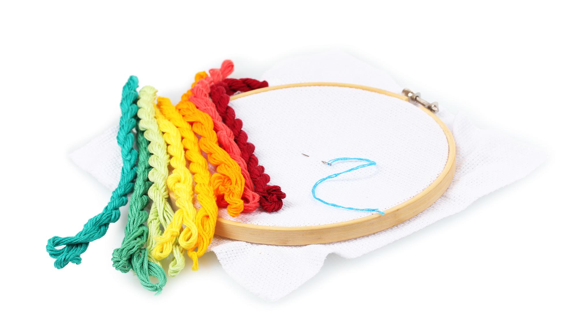 Close-up of embroidered sampler on hoop